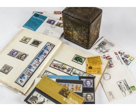 A collection of stamps and First Day Covers, some pre- and post decimal mint, a schoolboy album with Victorian, Edwardian and