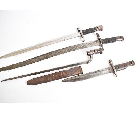 A Ross Mk2 with scabbard, together with an 1856 pattern yataghan, a Martini socket bayonet by R &amp; W.A, and a Martini swor