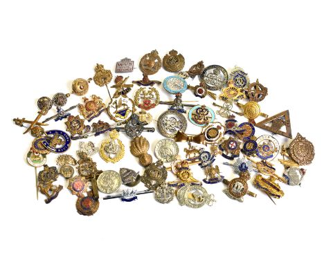 A large group of regimental pin badges, to include REME, Army Cyclist Corps, ASC, Tenth London Hackney, RE, Tank Corps, The B