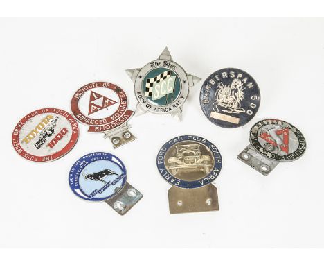 South African car badges, A small collection of car badges, including SCC Roof of Africa Rally, Barberspan 500, IAM Rhodesia,