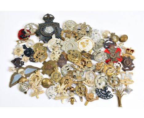 A collection of various cap badges, to include The Green Jackets, Royal Army Pay Corps, Scottish City of London National Guar
