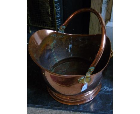 A Polished Copper Coal Helmet.
