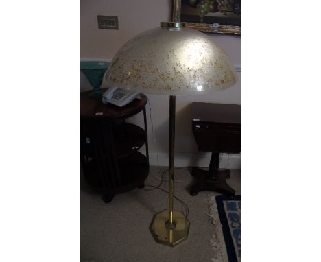 A Modern Standard Lamp, along with a bowl on stem and a wall clock.