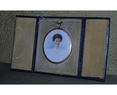 An Oval Miniature Portrait - Helen Wright (nee Kerr) contained in a leather folding case. 8cm x 6.5cm.