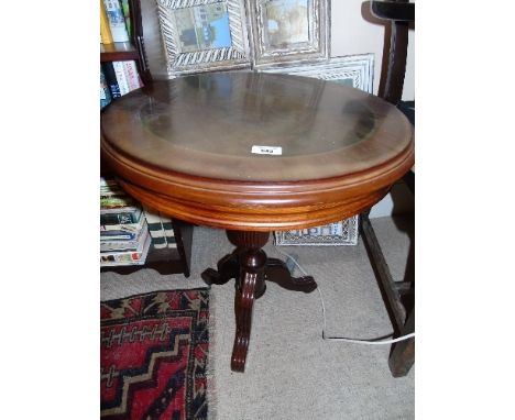 A Mahogany Circular Tripod Occasional Table & a Pair of Turned Candlesticks (3).