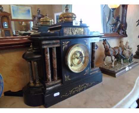 A 19th Century Black Slate Mantel Clock, inlaid with marble and raised on shaped plinth base.