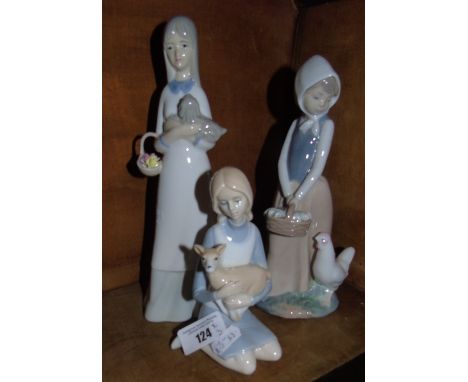 A Nao Figure of a Girl and a Chicken and two further (3).