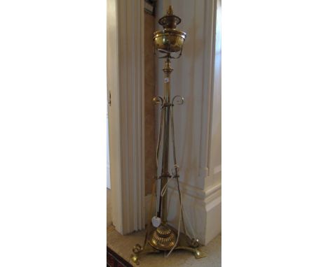 An Art Nouveau Brass Oil Standard Lamp. (converted)