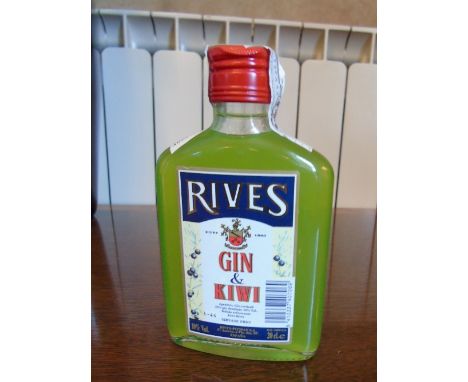 A Bottle of Old St. Andrews Liqueur, along with a bottle of Rives Gin and Kiwi.(2).