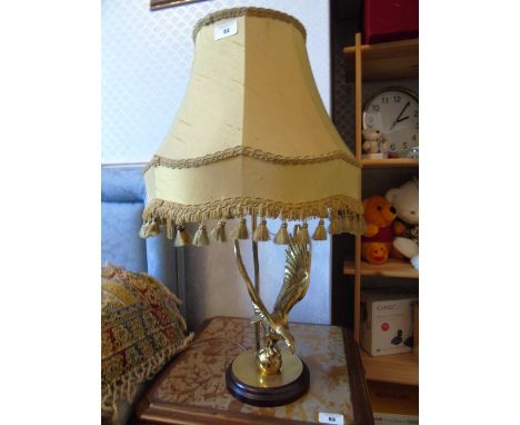 A Figural Brass Table Lamp, having an eagle on wooden base.