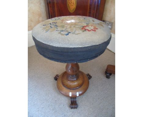 An Early Victorian Rosewood Rise and Fall Piano Stool, with embroidered top cicra 1840.