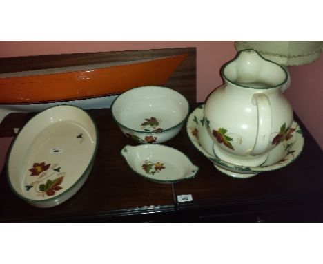 A Collection of Poole Pottery in the  'New England' Pattern, earthenware with sponged decoration, designed by Anita Harris in