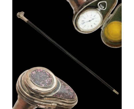A rare Walking Stick Cane, watch Ancora, early 20th century. Wood shaft with a silver handle in which the watch in a silver c