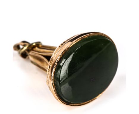 A 9ct rose gold jadeite seal fob, set with oval cabochon jadeite and relief embossed floral decoration, fob height 29.8mm, 6.