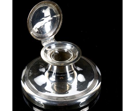 A large Edwardian silver Capstan inkwell, reeded decoration with clear glass liner, by W J Myatt & Co, hallmarks Birmingham 1