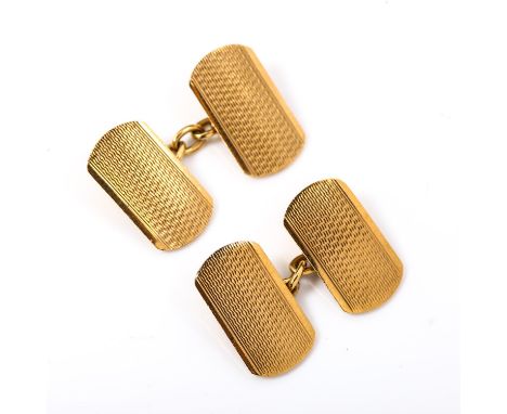 A pair of mid-20th century 9ct gold cufflinks, rounded rectangular form with engine turned decoration, maker's marks J G and 