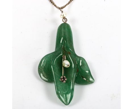 A large Chinese nephrite and pearl flowerhead pendant necklace, on unmarked fine curb link chain, pendant height 60.6mm, chai