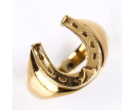 A late 20th century 9ct gold lucky horseshoe signet ring, maker's marks NA, hallmarks Sheffield 1990, setting height 13.8mm, 