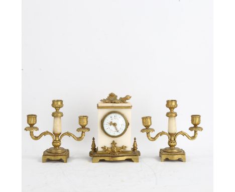 An early 20th century French white marble and ormolu 3-piece clock garniture, hand painted white enamel dial with Arabic nume