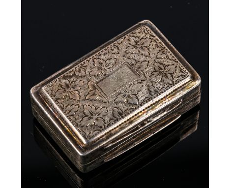 A William IV silver vinaigrette, rectangular form with bright-cut engraved floral decoration, gilt interior and pierced grill