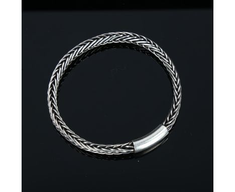 A Danish sterling silver foxtail link slave bangle, internal diameter 6.5cm, 28.2gNo damage or repair, only light surface wea