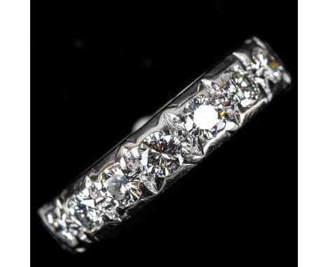 An 18ct white gold 7-stone diamond half eternity ring, set with modern round brilliant-cut diamonds, total diamond content ap