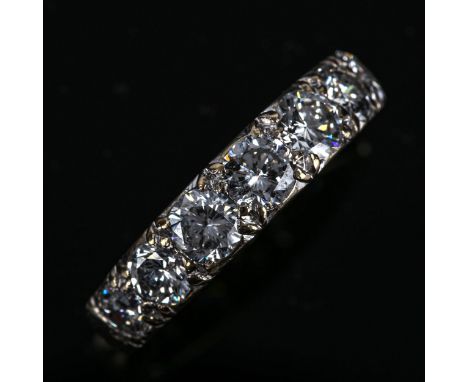 An 18ct white gold 7-stone diamond half eternity ring, set with modern round brilliant-cut diamonds, total diamond content ap