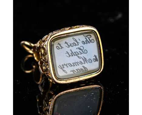 An Antique chalcedony seal fob, unmarked yellow metal settings, with relief floral decoration and seal motto "Tho lost to lig
