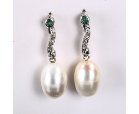 A pair of unmarked white gold pearl emerald and diamond drop earrings, with stud fittings, earring height 33.6mm, 6.7gNo dama