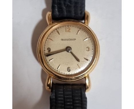 JAEGER LECOULTRE - a lady's Vintage gold mechanical wristwatch, silvered dial with quarterly gilt Arabic numerals, case no. 4