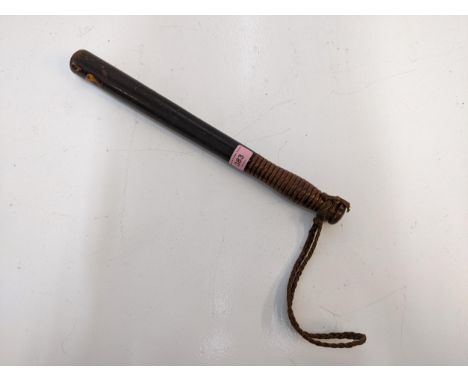 A convict service truncheon inscribed CS with a ribbed handle and hand ropeLocation:If there is no condition report shown, pl