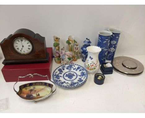 A mixed lot of ceramics and other items to include an Edwardian mantel clock with Roman dial, three Continental figures, four