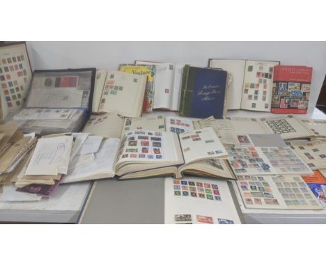A quantity of world stamp albums and loose examples to include commonwealth examples, Chinese, French, British and othersLoca