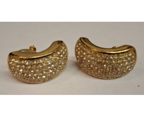Christian Dior- A pair of gold tone and white crystal half hoop pierced earrings, approx 3cm long. Location:CabIf there is no