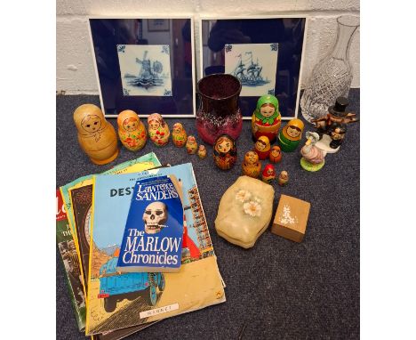 Mixed 20th Century household items to include wooden nesting dolls, Tintin books, 2 framed Delft tiles, a Goebbel figure of a