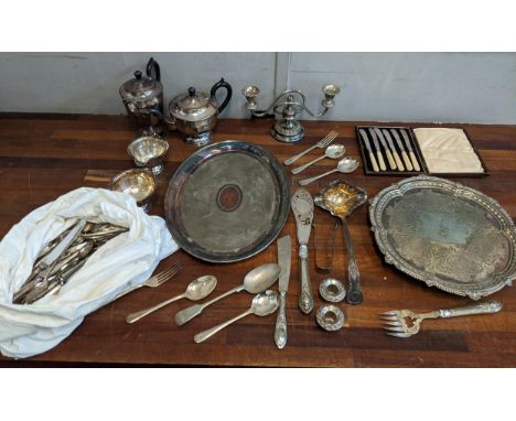 A mixed lot of silver plate to include a tea and coffee pot, milk jug and sugar bowl, a boxed set of butter knives, mixed fla