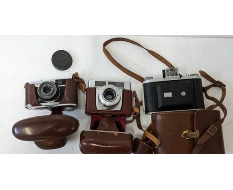 Three vintage cameras to include and Olympus Trip 35, a Zeiss Ikon, an Ensign SelfixLocation:GRIf there is no condition repor