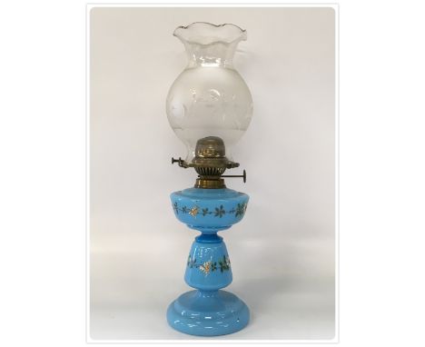 A BEDROOM OIL LAMP, HAND PAINTED BLUE GLASS BODY, ROWATT SPLIT WICK BURNER, ETCHED AND CUT GLASS SHADE (In-house packing unav