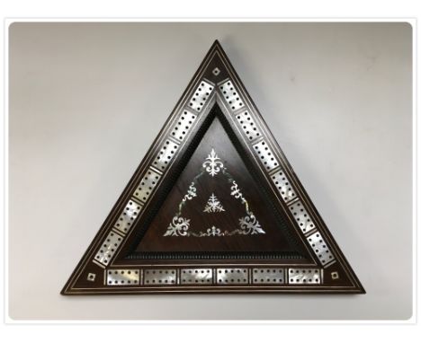A REGENCY ROSEWOOD INLAID TRIANGULAR CRIBBAGE BOARD THE CENTRAL DESIGN INLAID WITH MOTHER OF PEARL AND ABALONE 
