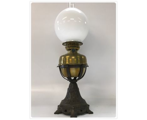 CENTRAL DRAUGHT OIL LAMP, CAST BASE DATED 1889, BRASS FONT, MODERN OPAL SHADE (In-house packing unavailable for this lot) 