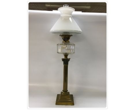 A FINE BRASS CORINTHIAN COLUMN DUPLEX OIL LAMP WITH CUT GLASS FONT AND OLD READING LAMP SHADE(In-house packing unavailable fo