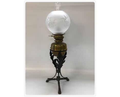 CENTRAL DROLIGHT OIL LAMP, CAST BASE AND CUP, BRASS FONT ETCHED SHADE (In-house packing unavailable for this lot) 