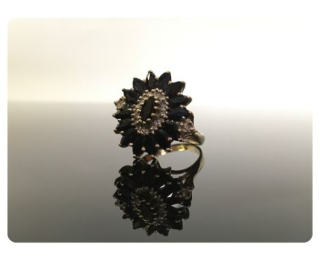 A SAPPHIRE AND DIAMOND RING OF FLOWER HEAD DESIGN, 9CT GOLD MOUNT 