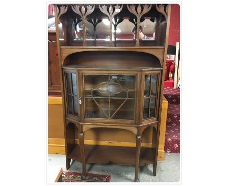 AN ARTS AND CRAFTS MAHOGANY INLAID GLAZED SIDE CABINET DECORATED WITH TULIPS, 107 CM WIDE, 167 CM TALL WITH RECESSED MIRROR, 