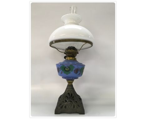 DUPLEX OIL LAMP DECORATIVE CAST BASE. HAND PAINTED BLUE GLASS FONT, OLD OPAL GLASS SHADE (In-house packing unavailable for th