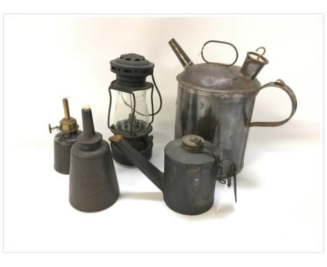 A PARAFFIN OIL CAN WITH A BRASS LABEL, JOSEPH BAKER, FAKENHAM, AN EARLY COAL MINERS SPOT LAMP, WELLS ENGINEERS LAMP, WELLS UN