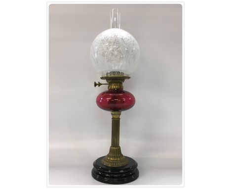 DUPLEX OIL LAMP, POTTERY BASE, BRASS COLUMN, FINE CRANBERRY FONT, WRIGHT AND BUTLER BURNER AND ETCHED GLASS SHADE (In-house p