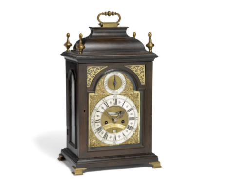A GEORGE III CHIMING MUSIC TABLE CLOCK, IN A DARK POLISHED CASE, THE MOVEMENT WITH EIGHT BELLS AND STRIKING BELL, REPEAT PULL