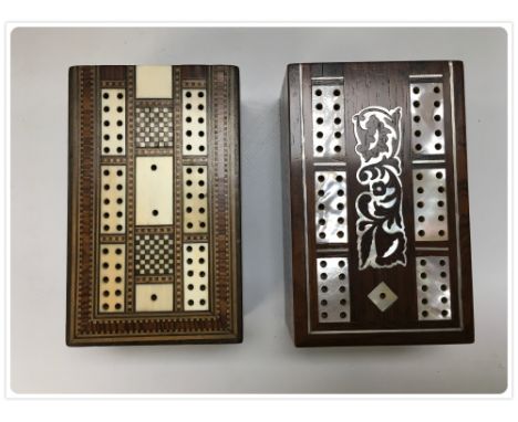 TWO INLAID 19TH CENTURY FOLDING CRIBBAGE BOXES - ONE INLAID WITH MOTHER OF PEARL THE OTHER CROSS BANDED WITH ROSEWOOD WITH BO
