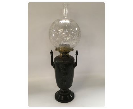 BRONZE BASED DUPLEX OIL LAMP WITH ORIGINAL WRIGHT AND BUTLER BURNER. ORIGINAL CONTAINER BASE, DAMAGED BUT ETCHED (In-house pa